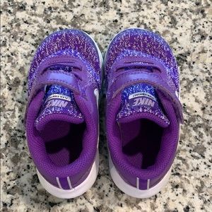Purple Nike shoes. Size 7